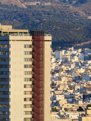 Landscape in Athens with skyscraper in view under sunset colors. Athens, Greece