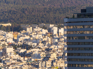 Landscape in Athens with skyscraper in view under sunset colors. Athens, Greece