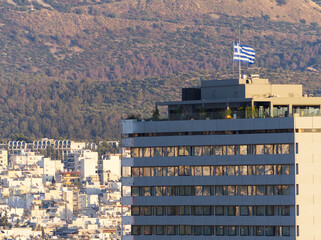 Landscape in Athens with skyscraper in view under sunset colors. Athens, Greece