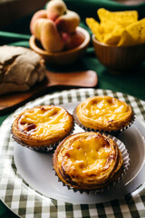 Traditional Portuguese Pastéis de Belém or Pastéis de Nata — Iconic Custard Tarts with Crispy Pastry and Creamy Filling