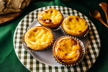 Traditional Portuguese Pastéis de Belém or Pastéis de Nata — Iconic Custard Tarts with Crispy Pastry and Creamy Filling