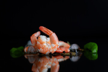 Isolated studio composition of shrimp and spices on a background
