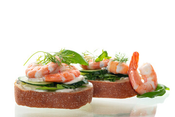 morning sandwiches with boiled shrimps on a white background
