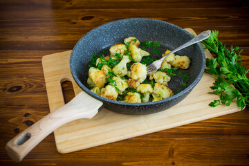 Top view of crispy cauliflower with parsley