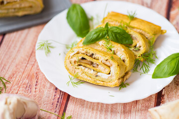 Fototapeta premium Hearty zucchini roll with piquant filling