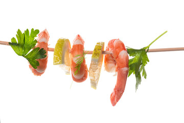 Still life of shrimps with lemon on white background