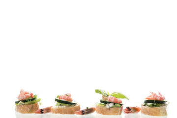 Gourmet appetizer with shrimps, greens and cucumbers for a buffet
