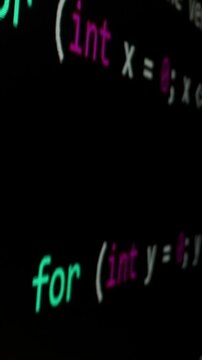 Closeup macro shot movement of coding script moving across LED screen with real-time AI-generated typing, showcasing advanced AI learning in optimization, debug and coding for software development.