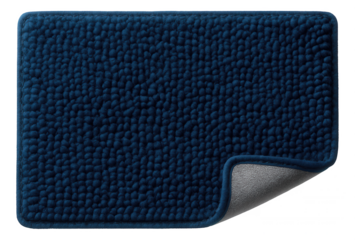 A chenille bath mat in a deep blue hue, adding a pop of color to a minimalist home bathroom.