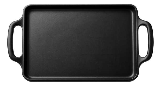 Cast iron griddle with a flat, rectangular surface for making pancakes on a home stovetop.