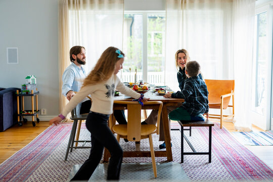 Happy family spending leisure time with each other at home