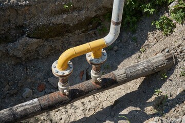 Construction site utility pipes hole