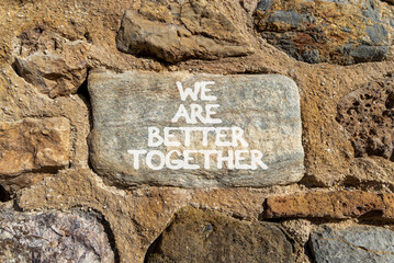 We are better together symbol. Concept words phrase We are better together on beautiful grey stone wall. Beautiful stone wall background. Business We are better together concept. Copy space.