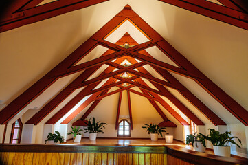 Warm Wooden Attic Interior with Geometric Design