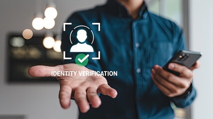 Man holding out hand with digital identity verification icon and checkmark using smartphone for authentication
