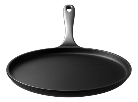A flat crepe pan with a low rim, perfect for making thin pancakes in a city loft.