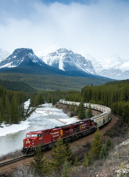 Canadian pacific railway train moving through snowy canadian rockies, April 28, 2007