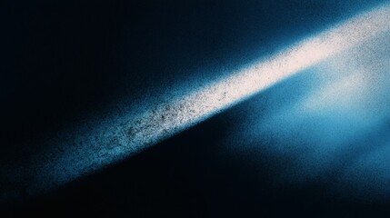 Abstract diagonal light beam with textured blue and white gradient on dark background