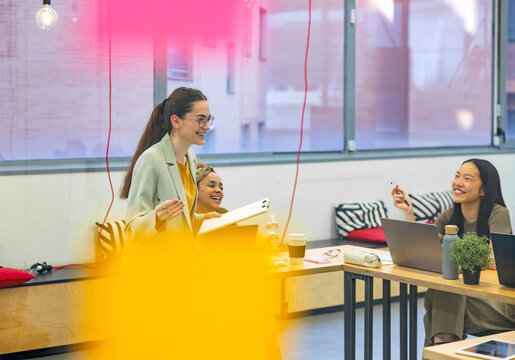 Business multiethnic team collaborating in a bright modern office