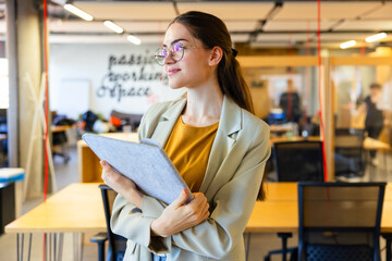 Young professional woman in modern office setting
