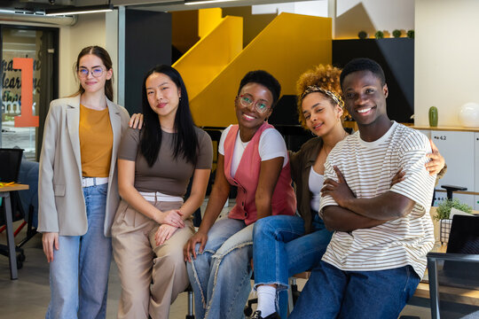 Diverse group of young professionals in an office setting