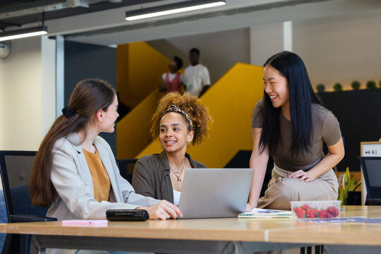 Collaborative team discussion in modern office setting
