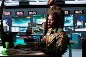 African warlord in base of operations housing operational missile defense system designed to...
