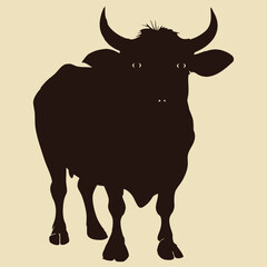 Silhouette of a Wildebeest Standing Against a Light Background