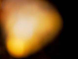Colorful light leaks on black background for design and special effects. Retro film look. Abstract...