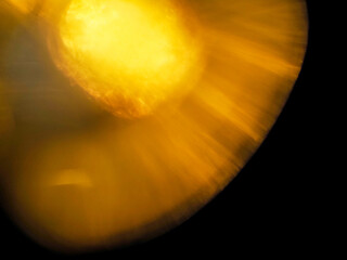Colorful light leaks on black background for design and special effects. Retro film look. Abstract...