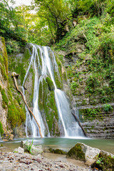 Scenic view of the twin waterfalls in Faedis, located in the forested hills of northeastern Italy....