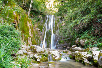 Scenic view of the twin waterfalls in Faedis, located in the forested hills of northeastern Italy....