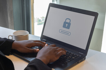 closeup hands typing password, internet security and data protection