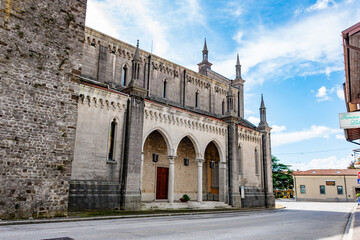 A traditional Catholic church in the village of Faedis, northeastern Italy, featuring a stone facade, bell tower, and peaceful surroundings. Perfect example of rural Italian religious architecture.

