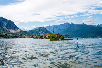 The beatiful isles of lago maggiore with mountains in the background