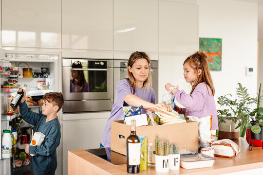 Active grocery unpacking at home