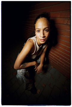 Beautiful woman posing in the night street