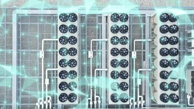 Aerial of data center building with HVAC systems and 3D data graphics overlay showing digital infrastructure