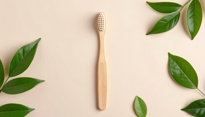 Bamboo Toothbrush with Green Leaves on Beige Background