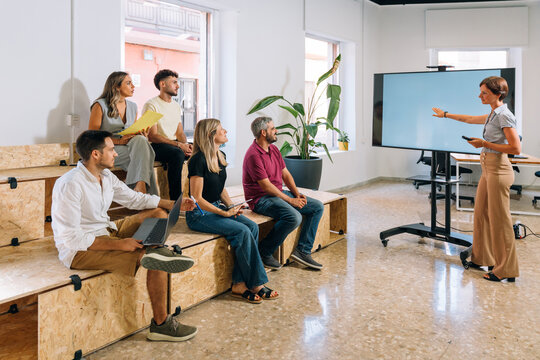 Marketing professional presenting business growth 