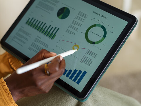 Woman analyzing marketing report