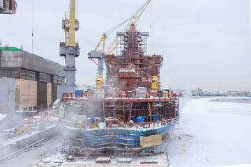 Construction of an icebreaker at a shipyard.