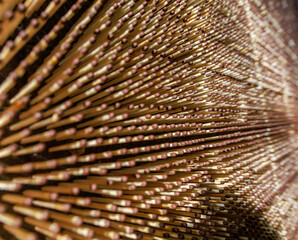 A close-up view of a dipping machine in a match factory.