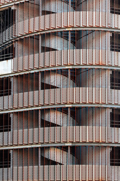 Geometric Facade with Metal Grates