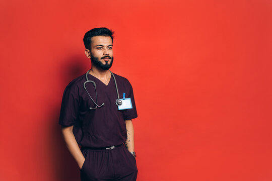 Portrait of Indian doctor in studio.