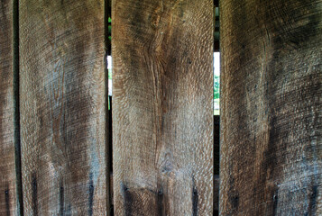 Dark brown vertical barn wood background