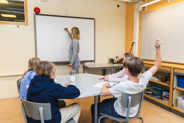 Teacher Presenting to Small Group