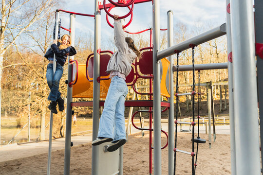 Kids on Playground Rings