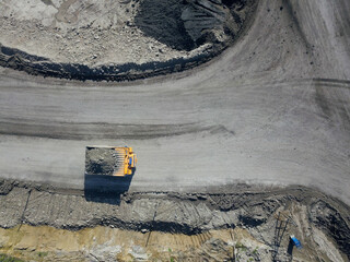 Open-pit coal mining in a large quarry.