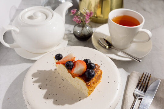 Cheesecake with berries on the table